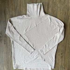 Cream asymmetric turtleneck sweater